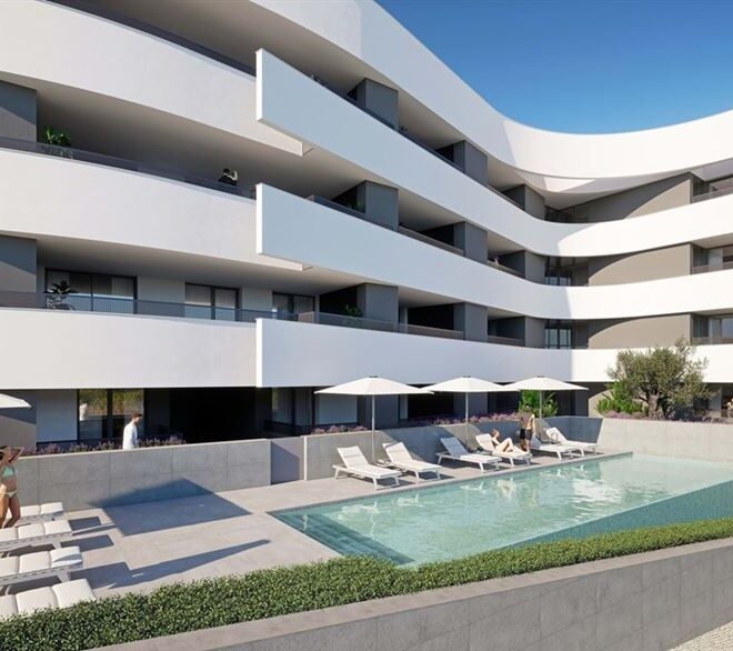 Buy property in the Algarve, Luxury Apartment in Porto de Mós – 2-Bedroom for Sale